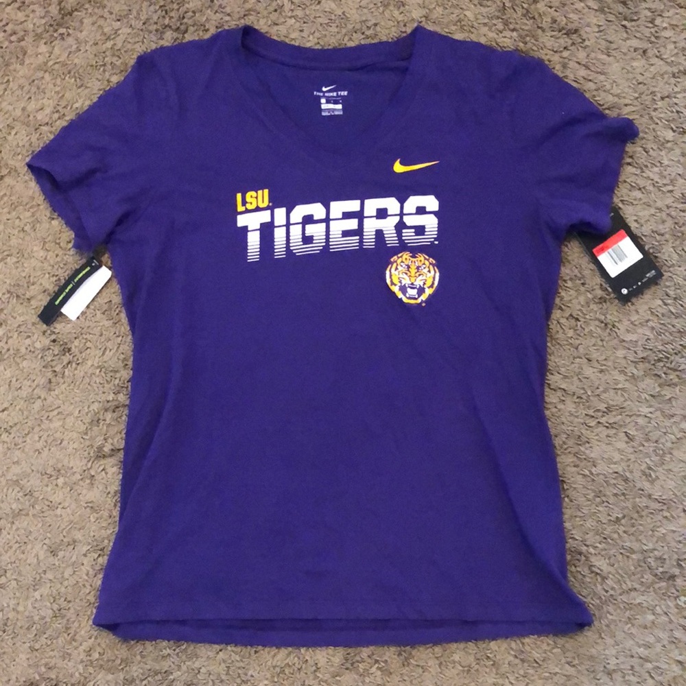 Women’s LSU tigers shirt, dri-fit new with tags. Yellow Nike sign, short sleeve